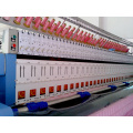 La machine de broderie de Quiltting de Yuxing peut faire le piquage et la broderie ensemble